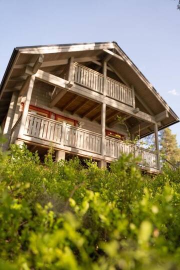 Фото номера Коттедж с видом на озеро Курортные отели Holiday Village Kukkapää г. Сулкава 10