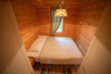Фото номера Коттедж с видом на озеро Курортные отели Holiday Village Kukkapää г. Сулкава 13