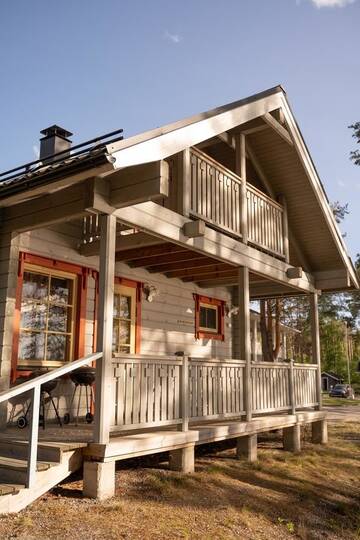 Фото номера Коттедж с видом на озеро Курортные отели Holiday Village Kukkapää г. Сулкава 9