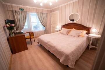 Фото номера Большой двухместный номер с 1 кроватью Курортные отели Holiday Village Kukkapää г. Сулкава 2